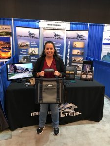 Tammy Luther at Midwest Steel booth at NISTM Conference