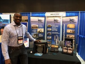 Charles Hensley at Midwest Steel booth at NISTM Conference